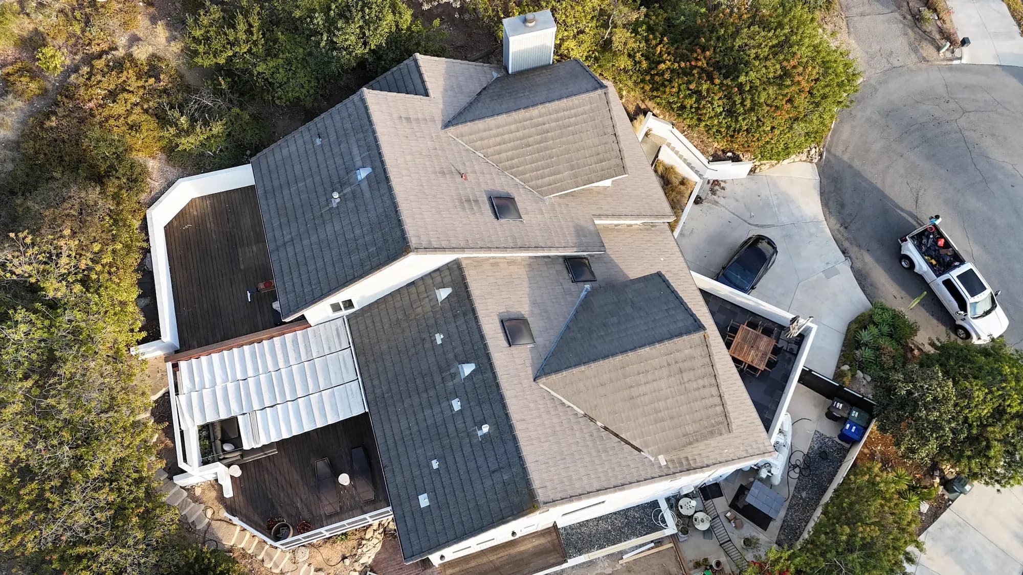 Two-story re-roof by White Palm Roofing